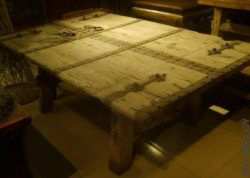 Tabletop of a lounge style coffeetable, made from an old door.
