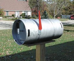 Small size beerkeg used as mailbox.