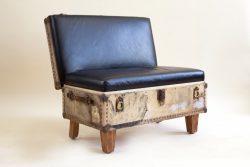 Low bench made from a pretty antique suitcase.