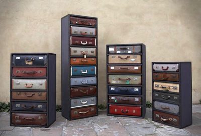 Cupboards with drawers made from repurposed suitcases.