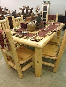 Farmhouse style dining table and homemade chairs.