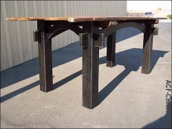 Repurposed door in use as the tabletop for a homemade farmhouse kitchen table.