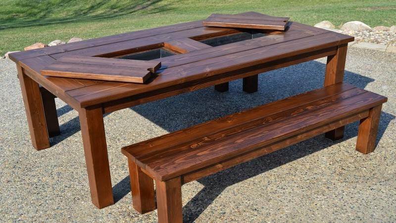 Cooler table with ice bucket in the tabletop.