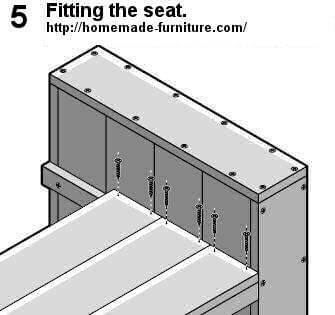 Fitting of the seats for a homemade lounge set of reclaimed wood.