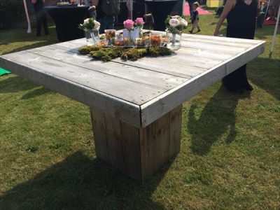Square garden table design with a planter in the center of the tabletop.
