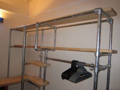 Wardrobe made from scaffolding pipes and reclaimed wood.