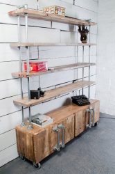 In the living room, cabinet with shelves made from reclaimed scaffolding.