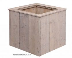 Square wooden planter made of scaffold planks.