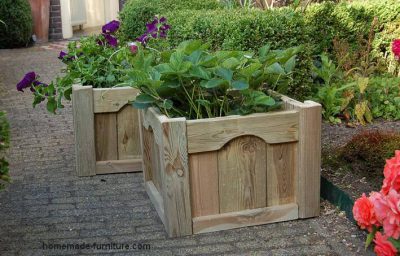Solid wooden plant boxes for outside.