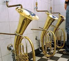 Trombones recycled to make urinals in a jazz cafe.