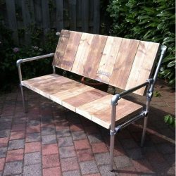 Garden bench made with a frame from scaffolding tubes and Kee clamps.