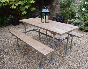 Garden table with benches, made from old scaffold pipes.